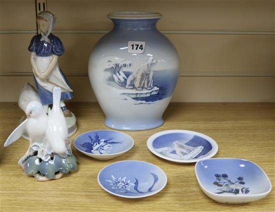 A quantity of Royal Copenhagen vase, dishes and a figure and bird group